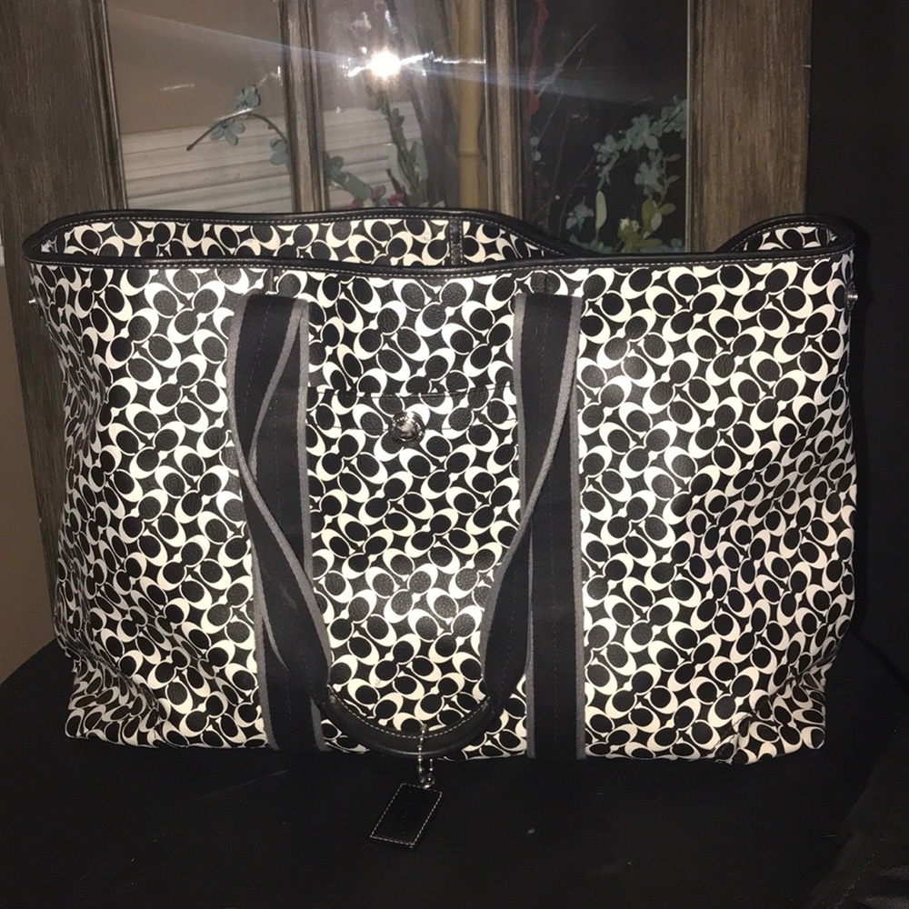 Authentic Coach weekend luggage bag.